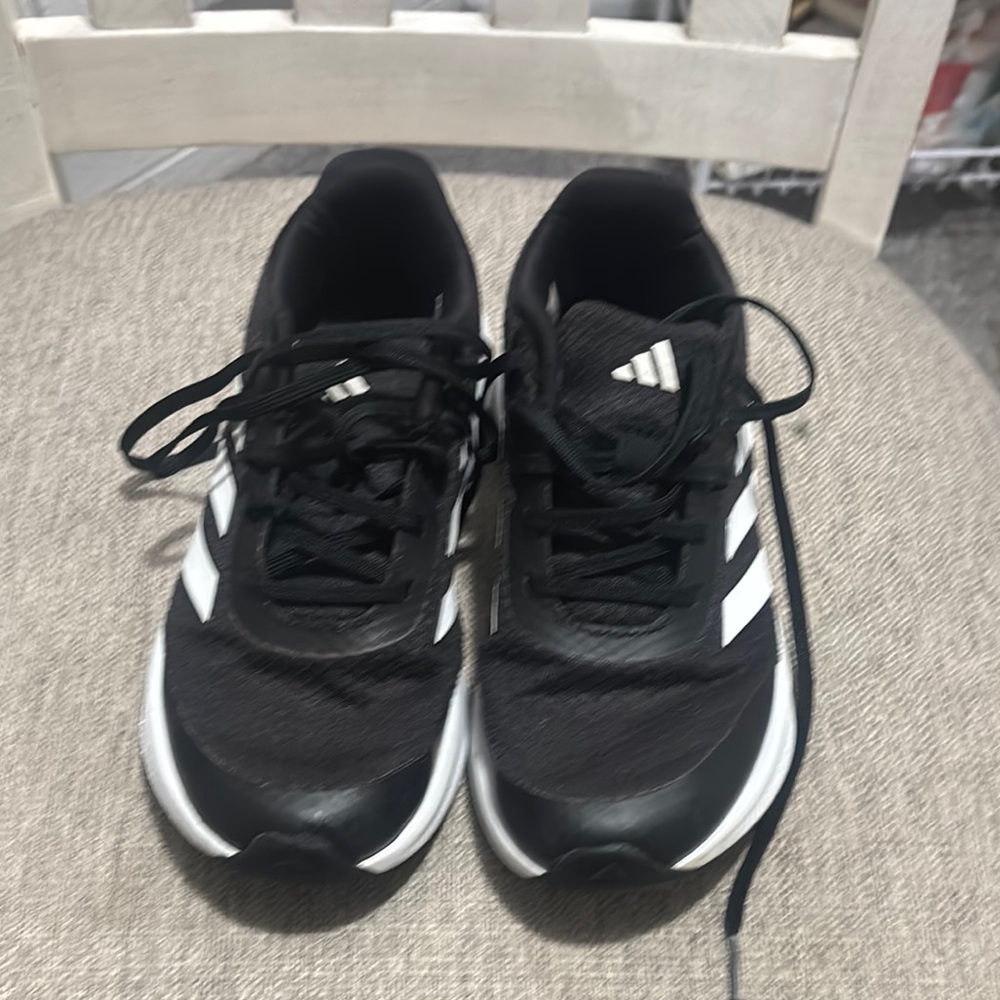 Adidas Black and White Athletic Shoes with Classic Stripes